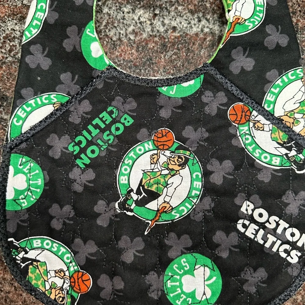 Handmade reversible quilted baby bib in Boston Celtics print